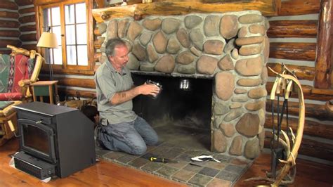 installing a stainless liner to a steel fire box|wood burning fireplace liner installation.